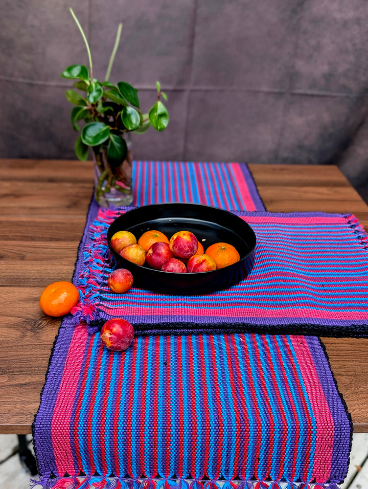 Carnival Parade Cotton Table Set – Lively blue, magenta, and pink linear patterns